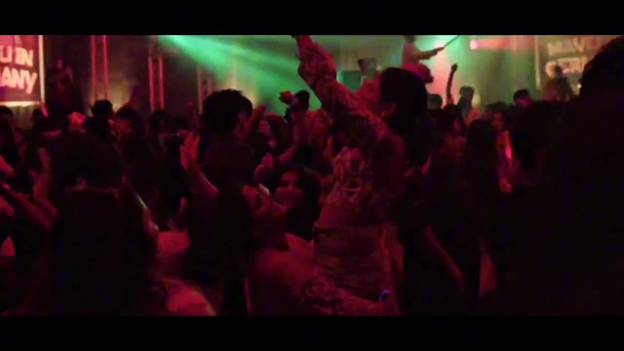 NIKJAY performing on a cultural stage